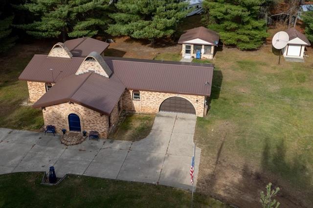 front view picture of 10279 N Finley Lake Avenue, Harrison, MI. 48625