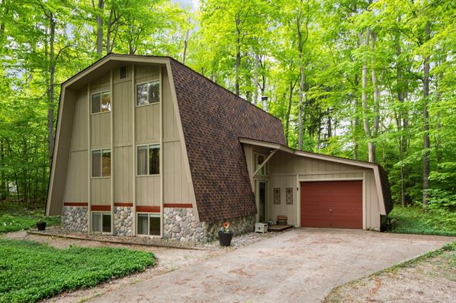front view picture of 2510 E Cherry Lane, Cedar, MI. 49621