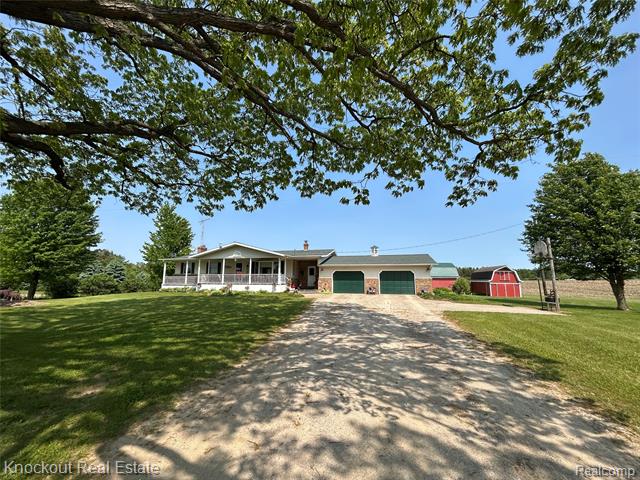 front view picture of 10429 Mcpherson Road, Millington, MI. 48746