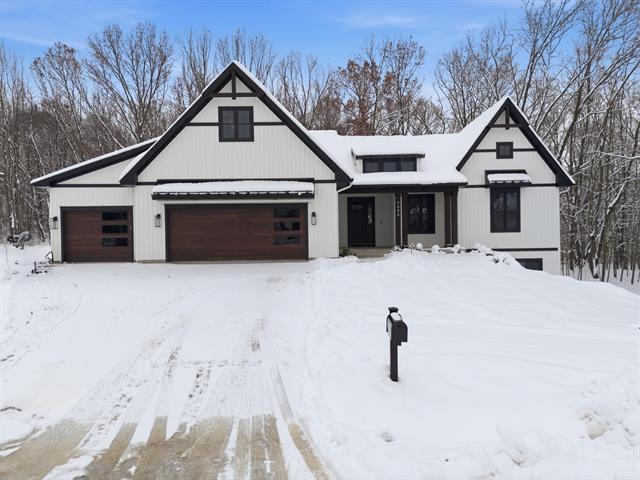front view picture of 9898 Windflower Lane, Portage, MI. 49024