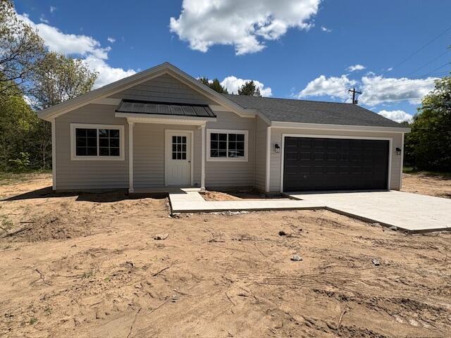 front view picture of 8121 Bowens Mill Road, Middleville, MI. 49333