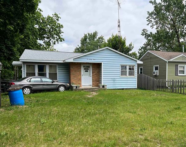 front view picture of 1023 Sutton Road, Adrian, MI. 49221