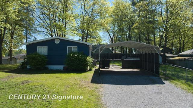 front view picture of 551 W Donald Drive, Sanford, MI. 48657