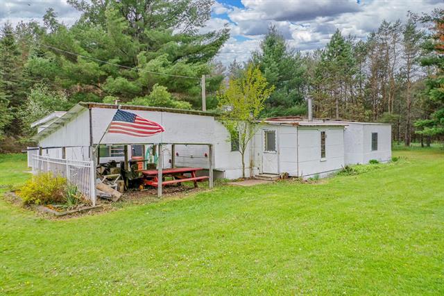 front view picture of 1151 N 8 Mile Road, Lake City, MI. 49651