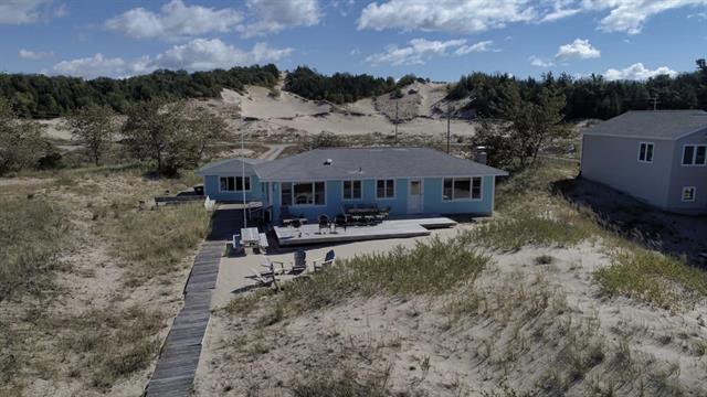 front view picture of 14463 Cathead Bay Drive, Northport, MI. 49670