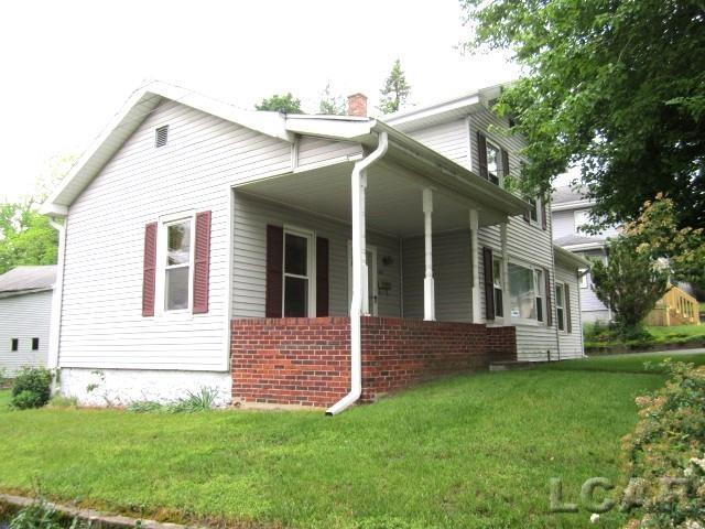 front view picture of 107 Seward Street Street, Hudson, MI. 49247