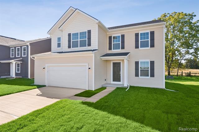 front view picture of 660 Countryside Drive, Chelsea, MI. 48118