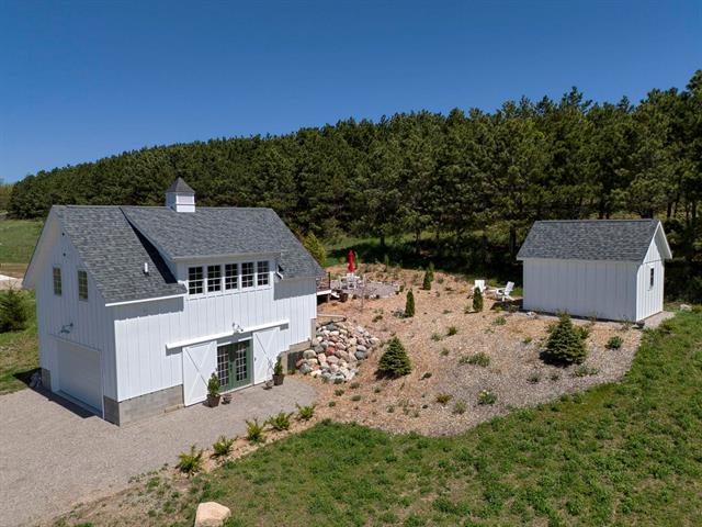 front view picture of 2494 N Setterbo Road, Suttons Bay, MI. 49682