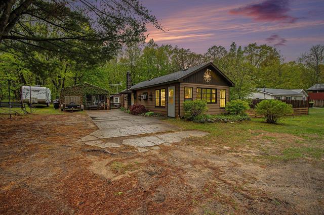 front view picture of 2077 W Clarence Road, Harrison, MI. 48625
