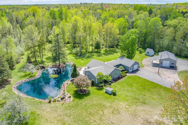 front view picture of 1703 Rau Road, West Branch, MI. 48661