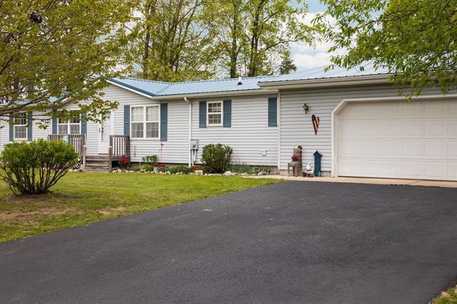 front view picture of 5206 S Riverview Drive, Lake City, MI. 49651