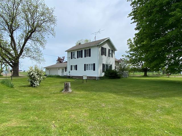 front view picture of 15500 5 Mile Road, Morley, MI. 49336