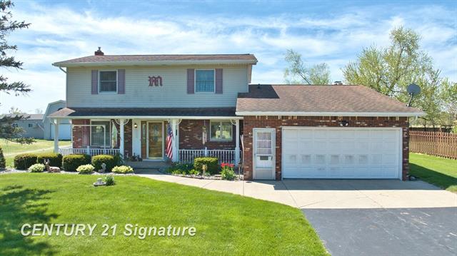 front view picture of 9115 Beecher Road, Flushing, MI. 48433