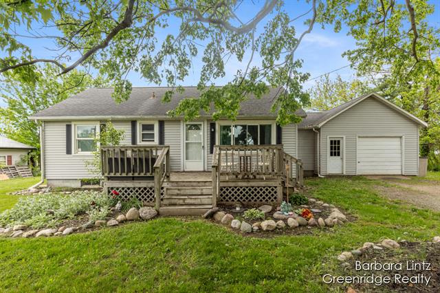 front view picture of 3650 Jordan Lake Street, Lake Odessa, MI. 48849