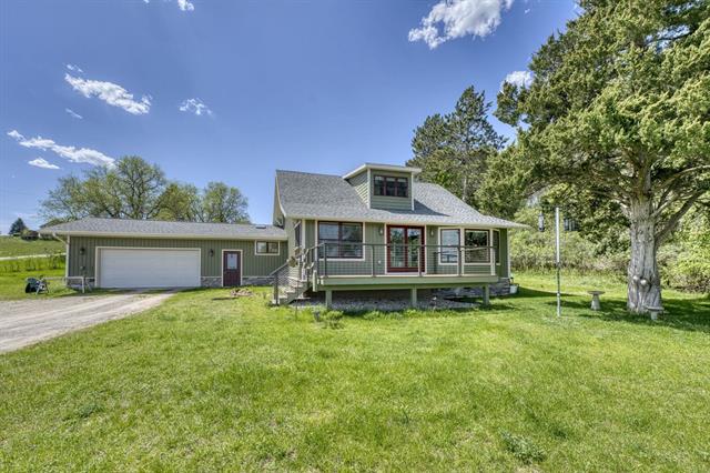 front view picture of 9560 S Cedar Road, Cedar, MI. 49621