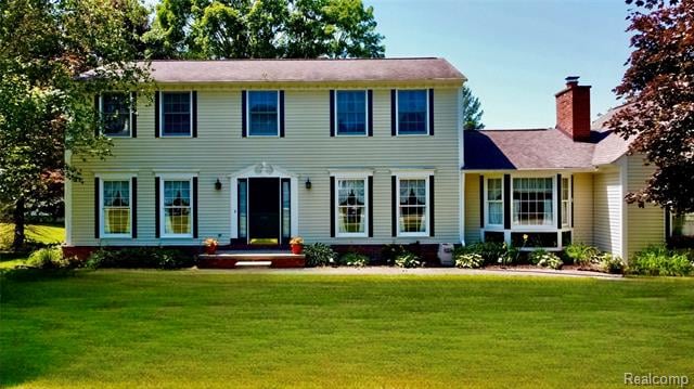 front view picture of 9276 Old Plank Lane, Brighton, MI. 48114