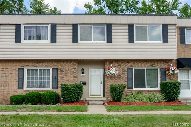 front view picture of 107 Astor Boulevard, Belleville, MI. 48111