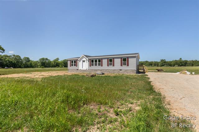 front view picture of 19150 Yankee Road, Morley, MI. 49336