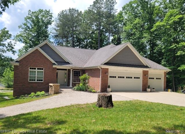 front view picture of 6233 Mack Road, Howell, MI. 48855