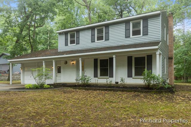 front view picture of 7361 Sheffield Drive Se, Ada, MI. 49301
