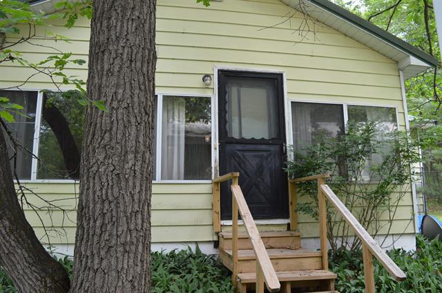 front view picture of 262 Ne E Bear Lake Road, Kalkaska, MI. 49646