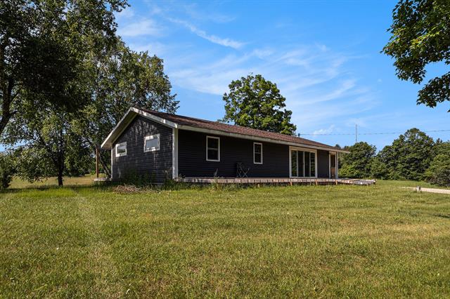 front view picture of 19665 13 Mile Road, Big Rapids, MI. 49307