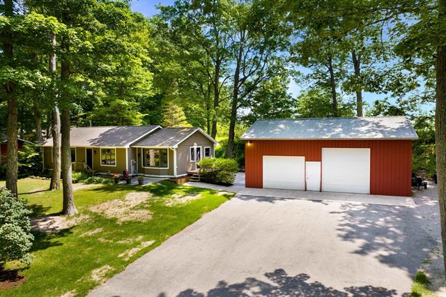 front view picture of 12310 E Lovers Lane, Suttons Bay, MI. 49682