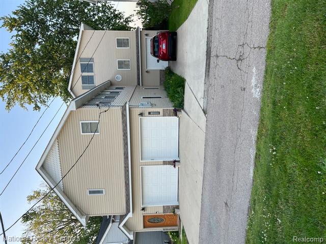 front view picture of 7888 Lakeshore Drive, Newport, MI. 48166