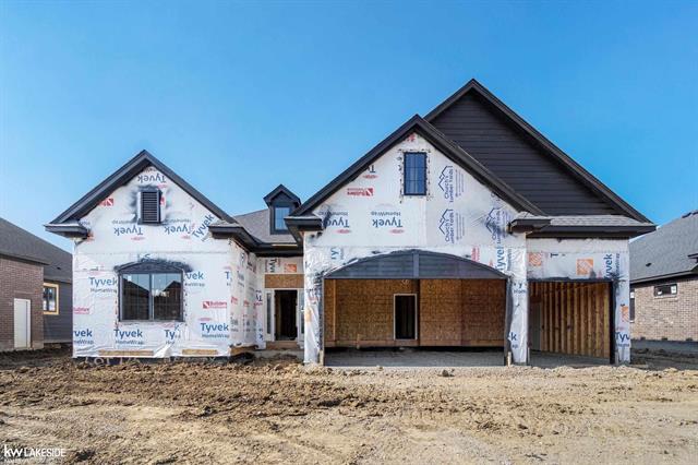 front view picture of 19307 Springbrook Drive, Macomb, MI. 48044