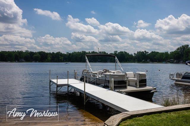 front view picture of 8360 Bay Drive Ne, Rockford, MI. 49341