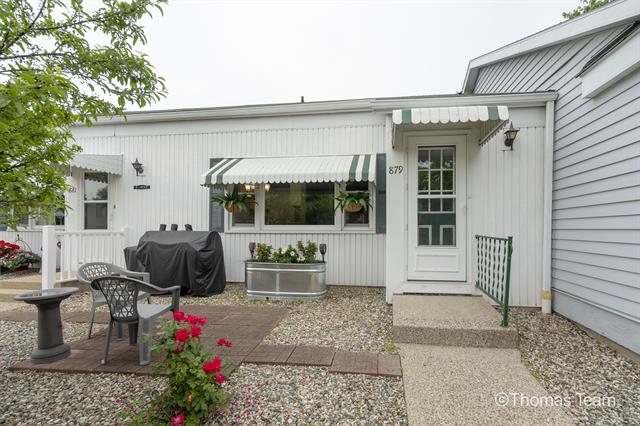 front view picture of 879 Village Lane, Jenison, MI. 49428