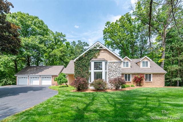front view picture of 175 Honey Creek Avenue Ne, Ada, MI. 49301