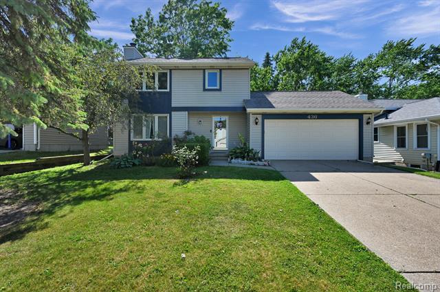 front view picture of 436 Dutch Hill Drive, Lansing, MI. 48917