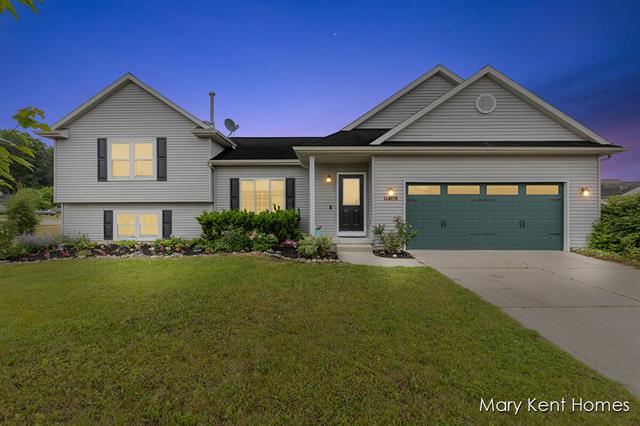 front view picture of 11409 Barnsley Se, Lowell, MI. 49331