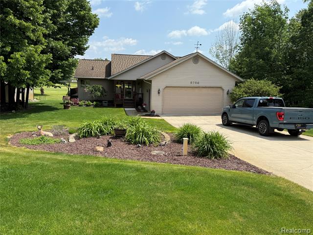 front view picture of 5756 Greensboro Way, Gladwin, MI. 48624