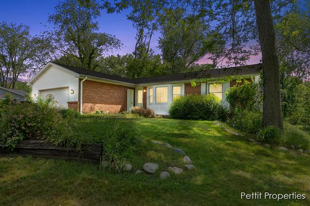 front view picture of 7544 Thornapple River Drive Se, Caledonia, MI. 49316