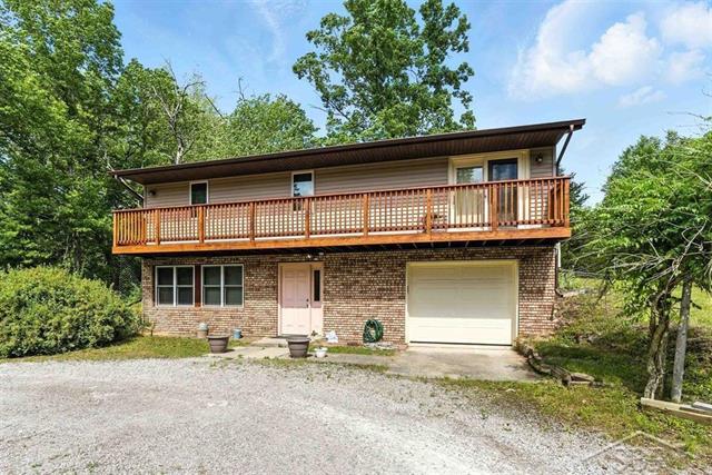 front view picture of 1776 N Seven Mile Road, Sanford, MI. 48657