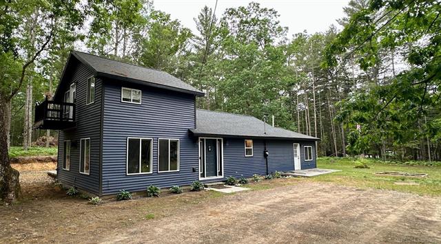 front view picture of 1100 Cedar Avenue, Prudenville, MI. 48651