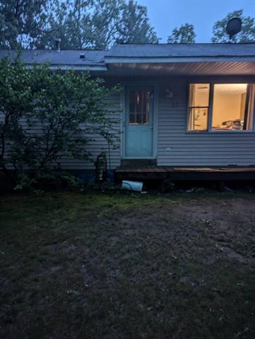 front view picture of 197 E Cedar Road, Twin Lake, MI. 49457