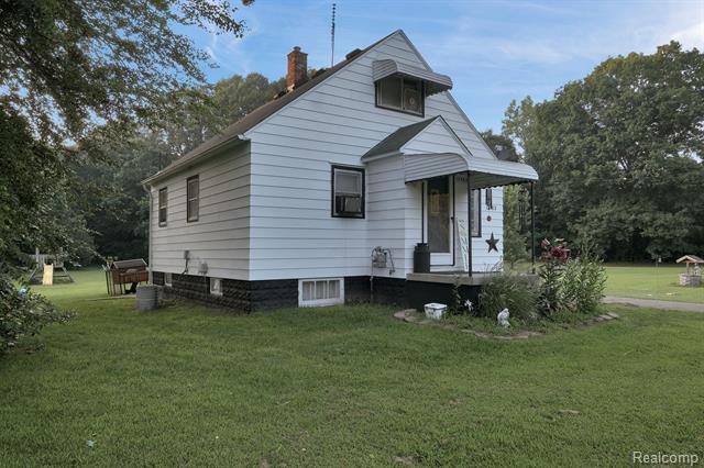 front view picture of 12483 Tuscola Road, Clio, MI. 48420