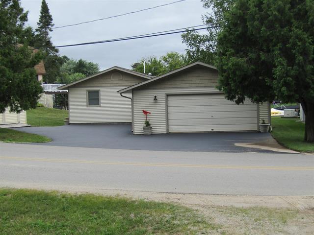 front view picture of 1580 N Ogemaw Trail, West Branch, MI. 48661