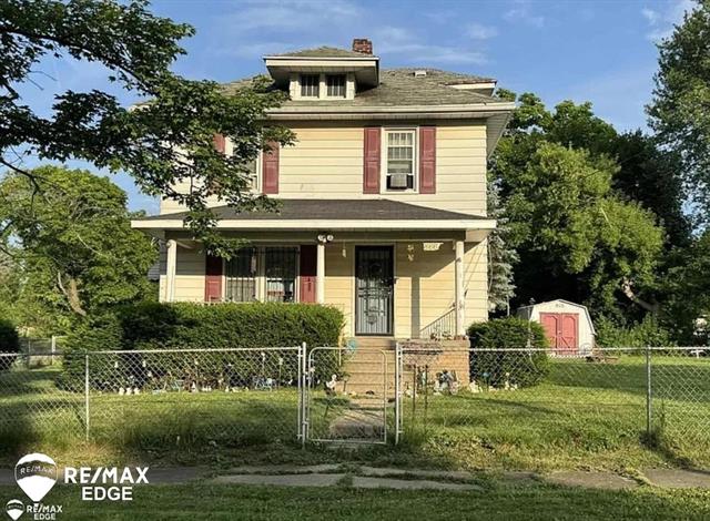 front view picture of 874 Tacken Street, Flint, MI. 48532