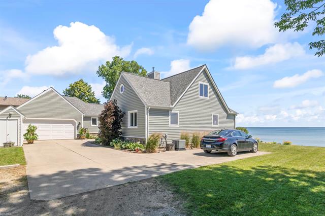 front view picture of 8329 Lakeshore Road, Lexington, MI. 48450