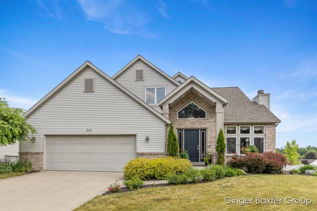 front view picture of 304 Glencarin Drive Ne, Rockford, MI. 49341