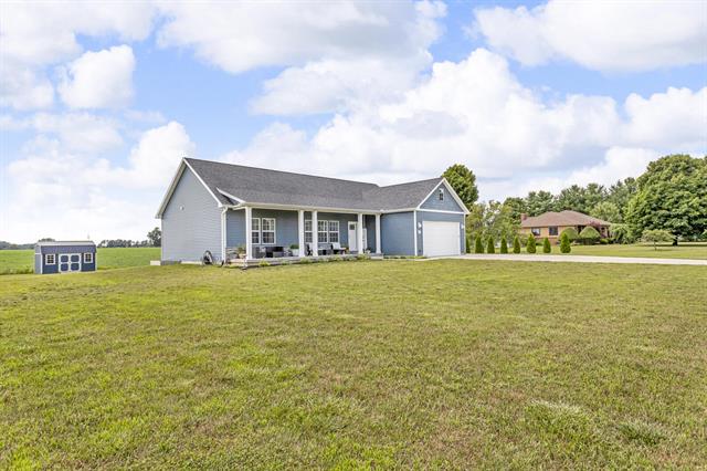front view picture of 1604 Wolf Lake Road, Grass Lake, MI. 49240