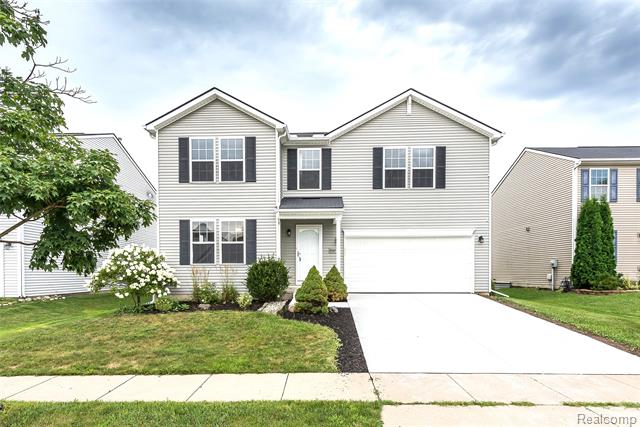 front view picture of 8067 Beechwood Boulevard, Dexter, MI. 48130