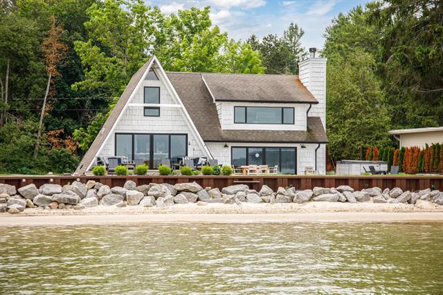 front view picture of 379 S Shore Drive, Suttons Bay, MI. 49682