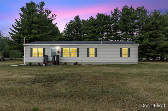 front view picture of 7396 S Garlock Road, Carson City, MI. 48811