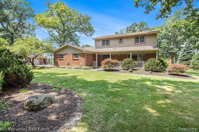 front view picture of 8900 Rickett Road, Brighton, MI. 48116
