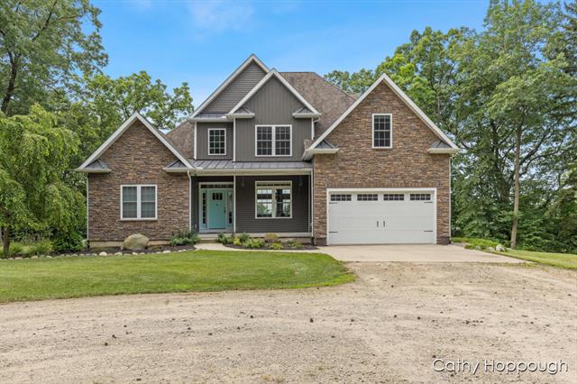 front view picture of 7620 Walnut Grv Road, Portland, MI. 48875